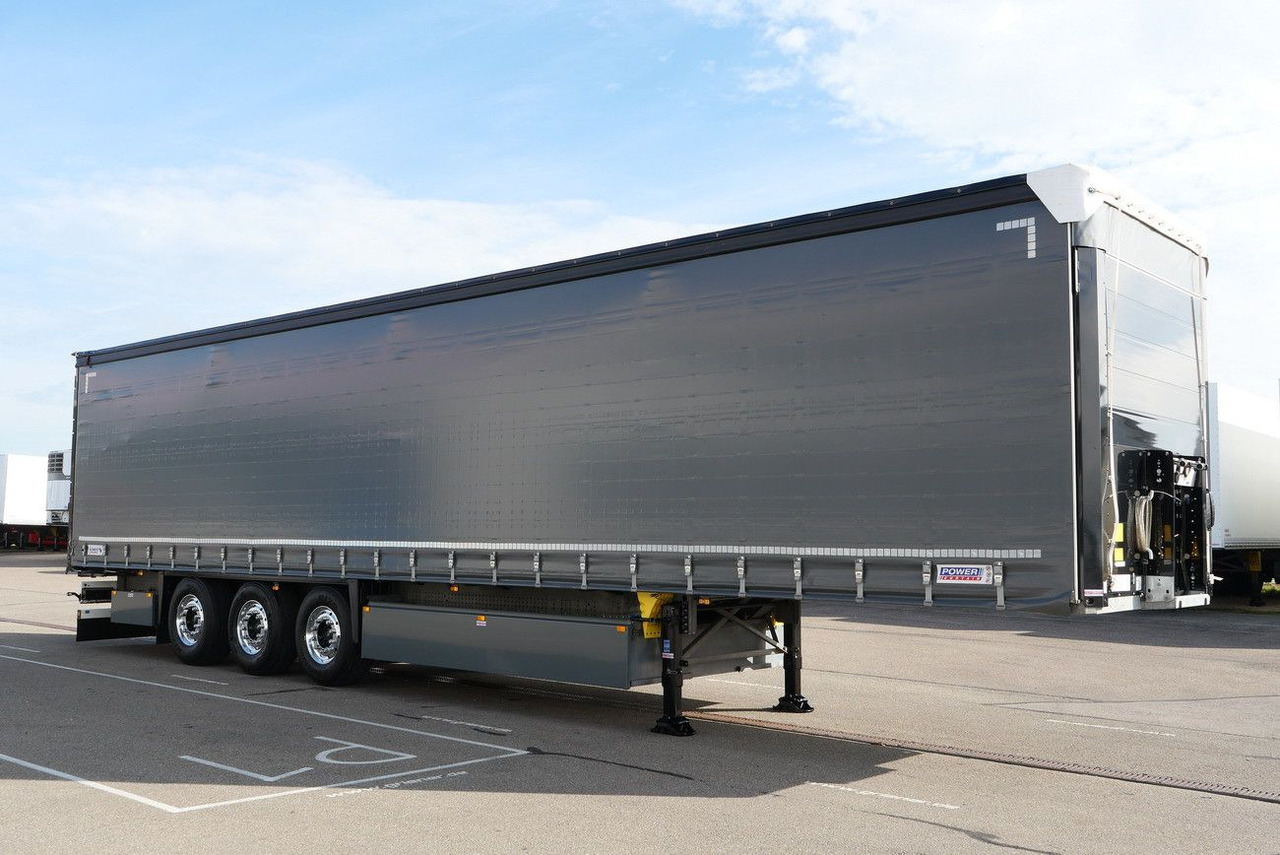 Schmitz Cargobull SCS 24 / ALU/LIFT /POWER CURTAIN DC 9,5 - Poluprikolica s ceradom: slika Schmitz Cargobull SCS 24 / ALU/LIFT /POWER CURTAIN DC 9,5 - Poluprikolica s ceradom Schmitz Cargobull SCS 24 / ALU/LIFT /POWER CURTAIN DC 9,5 - Poluprikolica s ceradom: slika Schmitz Cargobull SCS 24 / ALU/LIFT /POWER CURTAIN DC 9,5 - Poluprikolica s ceradom
