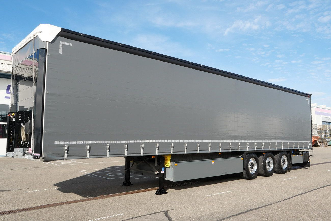 Schmitz Cargobull SCS 24 / ALU/LIFT /POWER CURTAIN DC 9,5 - Poluprikolica s ceradom: slika Schmitz Cargobull SCS 24 / ALU/LIFT /POWER CURTAIN DC 9,5 - Poluprikolica s ceradom Schmitz Cargobull SCS 24 / ALU/LIFT /POWER CURTAIN DC 9,5 - Poluprikolica s ceradom: slika Schmitz Cargobull SCS 24 / ALU/LIFT /POWER CURTAIN DC 9,5 - Poluprikolica s ceradom
