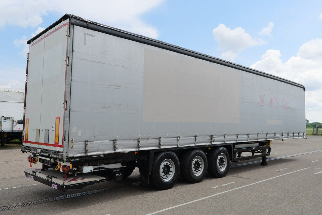 Schmitz Cargobull SCS 24/ LBW 2000 kg / RUNGENTASCHEN / HUBDACH - Poluprikolica s ceradom: slika Schmitz Cargobull SCS 24/ LBW 2000 kg / RUNGENTASCHEN / HUBDACH - Poluprikolica s ceradom Schmitz Cargobull SCS 24/ LBW 2000 kg / RUNGENTASCHEN / HUBDACH - Poluprikolica s ceradom: slika Schmitz Cargobull SCS 24/ LBW 2000 kg / RUNGENTASCHEN / HUBDACH - Poluprikolica s ceradom