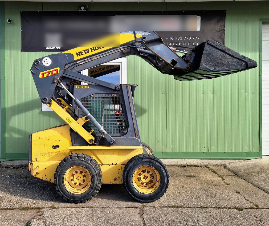 NEW HOLLAND S170 - Mini utovarivač: slika NEW HOLLAND S170 - Mini utovarivač NEW HOLLAND S170 - Mini utovarivač: slika NEW HOLLAND S170 - Mini utovarivač