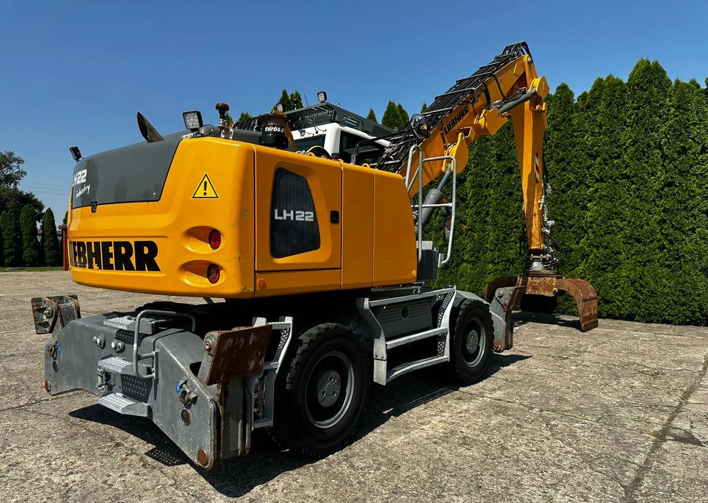 Liebherr LH22 M - Bager na kotačima: slika Liebherr LH22 M - Bager na kotačima Liebherr LH22 M - Bager na kotačima: slika Liebherr LH22 M - Bager na kotačima