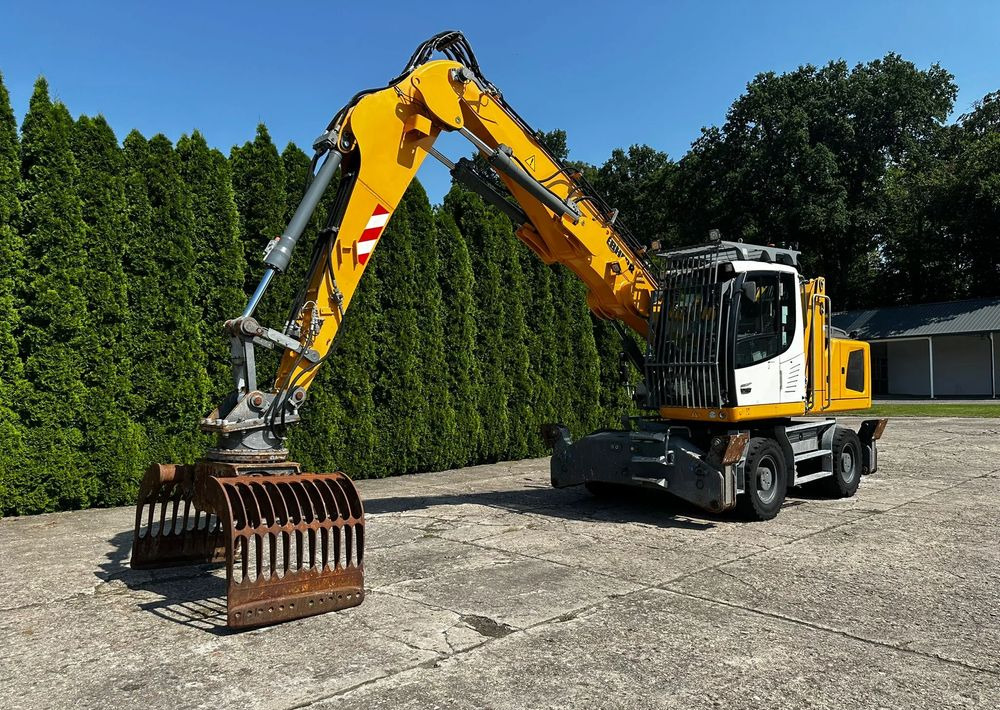 Liebherr LH22 M - Bager na kotačima: slika Liebherr LH22 M - Bager na kotačima Liebherr LH22 M - Bager na kotačima: slika Liebherr LH22 M - Bager na kotačima