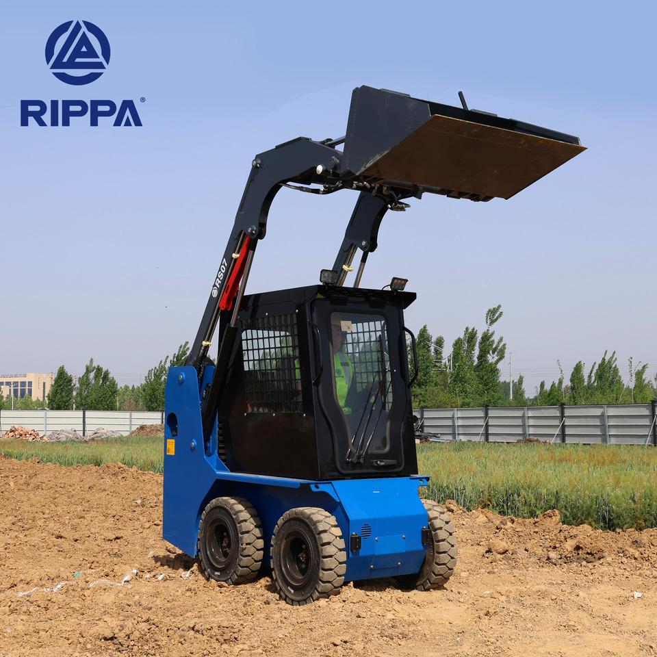 Rippa RS07 Compact Loader | 24.4hp Kubota Power | High Flow Dual Pump | Comfortable A/C Cabin - Mini utovarivač: slika Rippa RS07 Compact Loader | 24.4hp Kubota Power | High Flow Dual Pump | Comfortable A/C Cabin - Mini utovarivač Rippa RS07 Compact Loader | 24.4hp Kubota Power | High Flow Dual Pump | Comfortable A/C Cabin - Mini utovarivač: slika Rippa RS07 Compact Loader | 24.4hp Kubota Power | High Flow Dual Pump | Comfortable A/C Cabin - Mini utovarivač