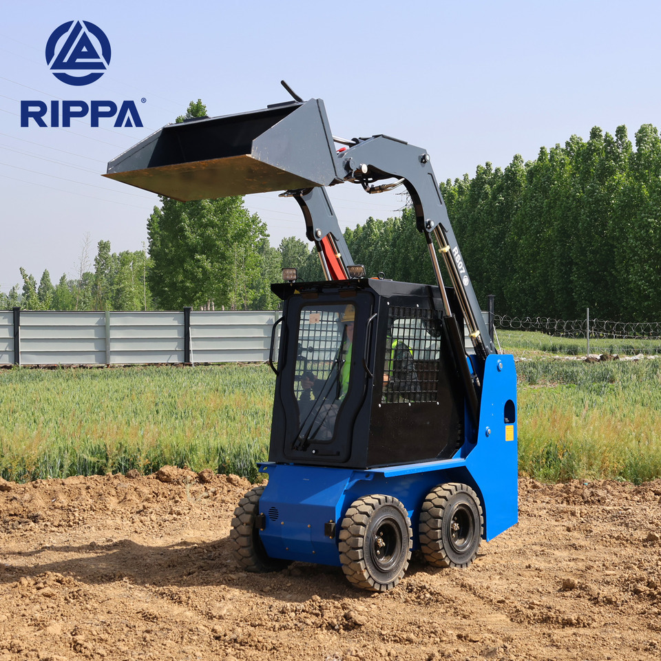 Rippa RS07 Compact Loader | 24.4hp Kubota Power | High Flow Dual Pump | Comfortable A/C Cabin - Mini utovarivač: slika Rippa RS07 Compact Loader | 24.4hp Kubota Power | High Flow Dual Pump | Comfortable A/C Cabin - Mini utovarivač Rippa RS07 Compact Loader | 24.4hp Kubota Power | High Flow Dual Pump | Comfortable A/C Cabin - Mini utovarivač: slika Rippa RS07 Compact Loader | 24.4hp Kubota Power | High Flow Dual Pump | Comfortable A/C Cabin - Mini utovarivač