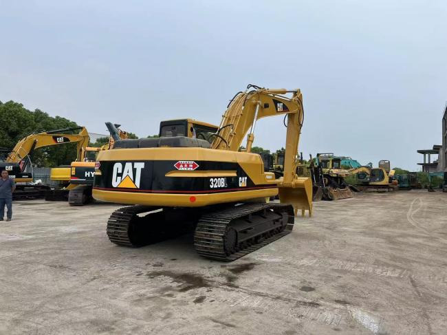 CAT 320BL - Bager gusjeničar: slika CAT 320BL - Bager gusjeničar CAT 320BL - Bager gusjeničar: slika CAT 320BL - Bager gusjeničar