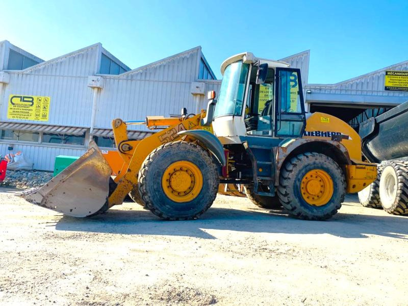 LIEBHERR Chargeuse L524 10T - Utovarivač na kotačima: slika LIEBHERR Chargeuse L524 10T - Utovarivač na kotačima LIEBHERR Chargeuse L524 10T - Utovarivač na kotačima: slika LIEBHERR Chargeuse L524 10T - Utovarivač na kotačima