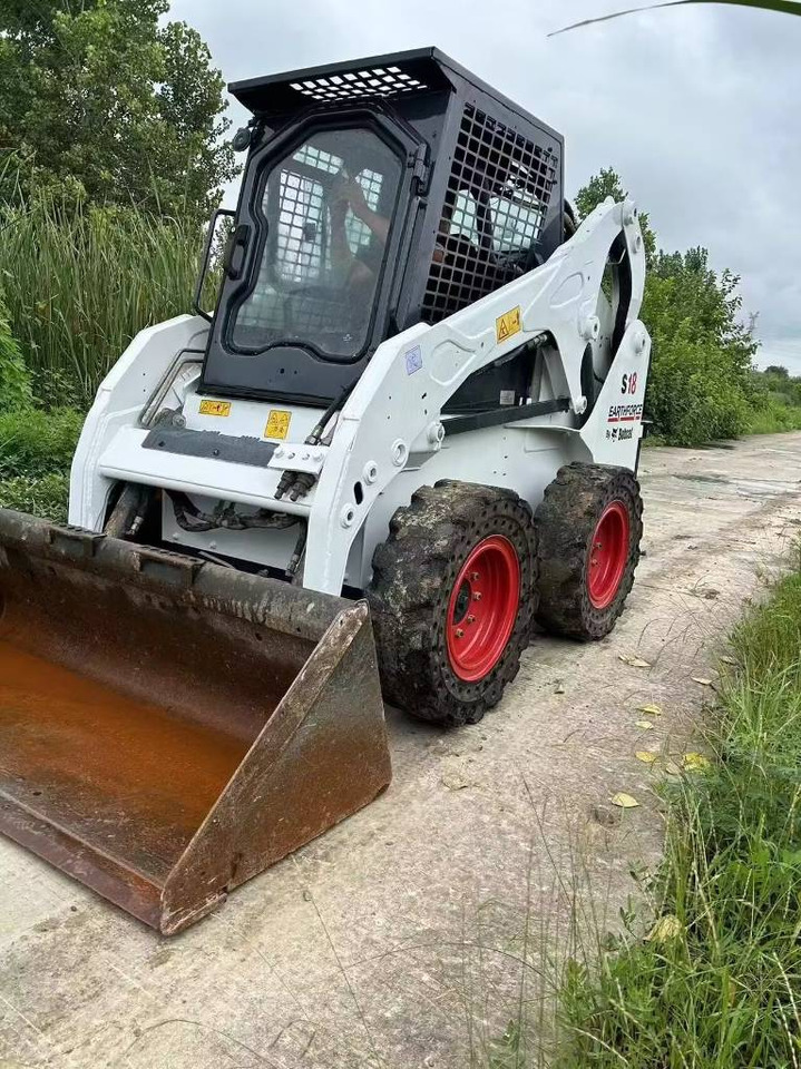 Bobcat S 18 - Mini utovarivač: slika Bobcat S 18 - Mini utovarivač Bobcat S 18 - Mini utovarivač: slika Bobcat S 18 - Mini utovarivač