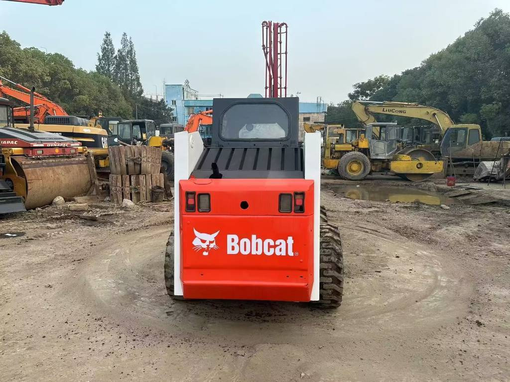 Bobcat S 185 - Mini utovarivač: slika Bobcat S 185 - Mini utovarivač Bobcat S 185 - Mini utovarivač: slika Bobcat S 185 - Mini utovarivač