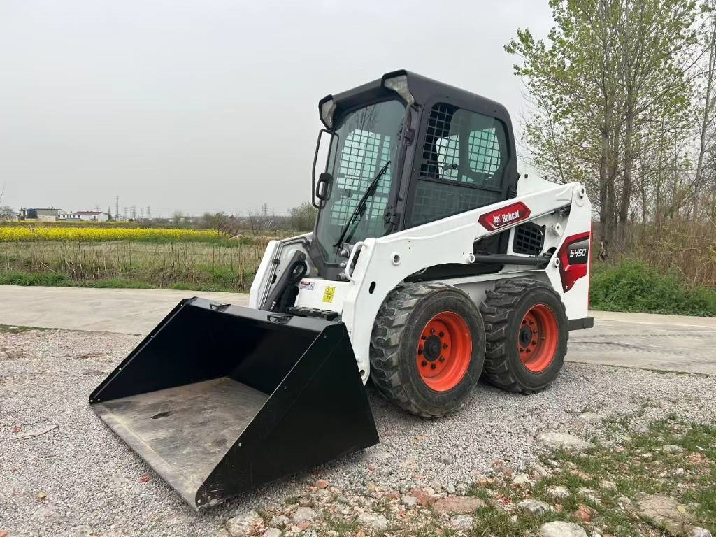 Bobcat S 450 - Mini utovarivač: slika Bobcat S 450 - Mini utovarivač Bobcat S 450 - Mini utovarivač: slika Bobcat S 450 - Mini utovarivač