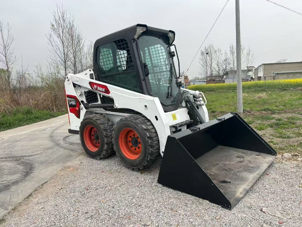 Bobcat S 450 - Mini utovarivač: slika Bobcat S 450 - Mini utovarivač Bobcat S 450 - Mini utovarivač: slika Bobcat S 450 - Mini utovarivač