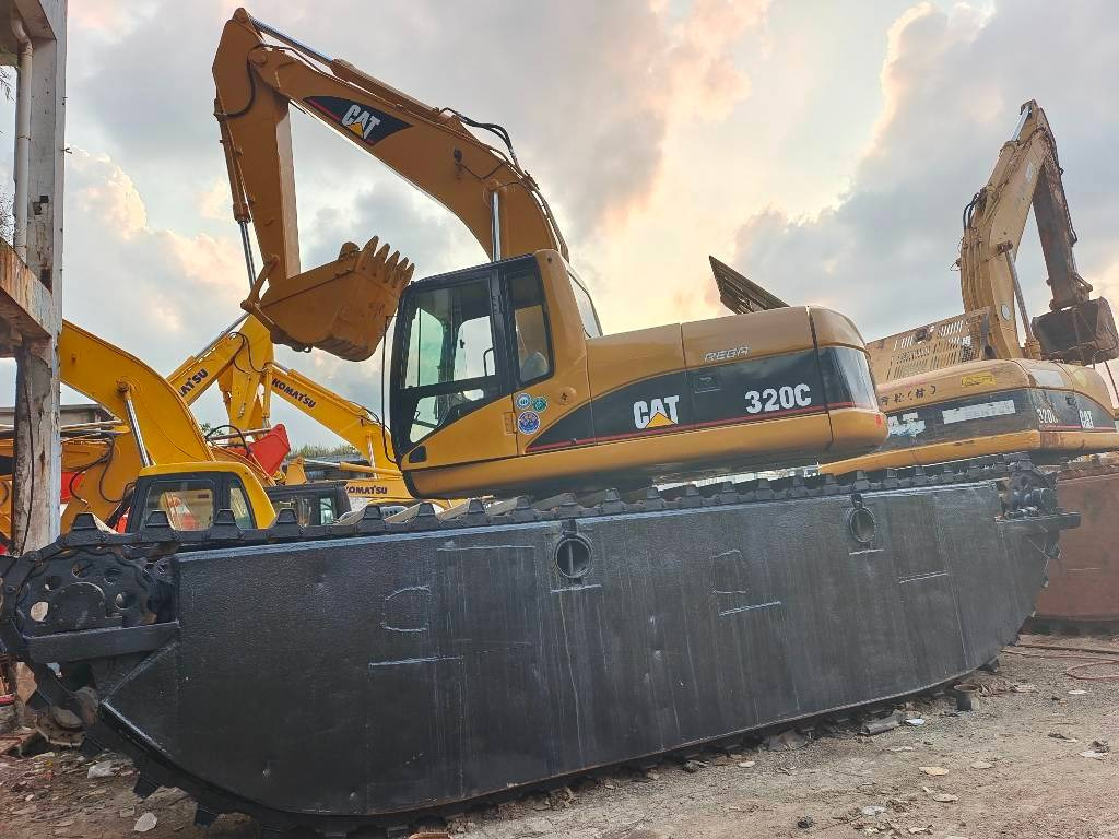 CAT 320 C - Bager amfibija: slika CAT 320 C - Bager amfibija CAT 320 C - Bager amfibija: slika CAT 320 C - Bager amfibija