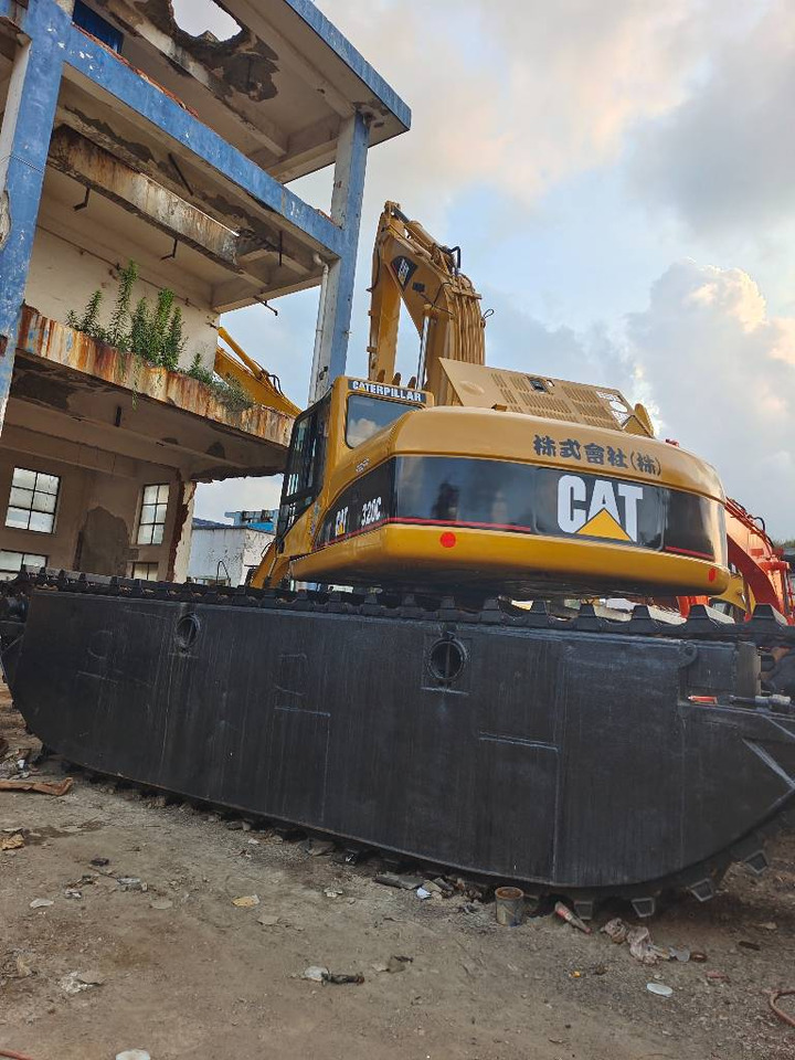 CAT 320 C - Bager amfibija: slika CAT 320 C - Bager amfibija CAT 320 C - Bager amfibija: slika CAT 320 C - Bager amfibija
