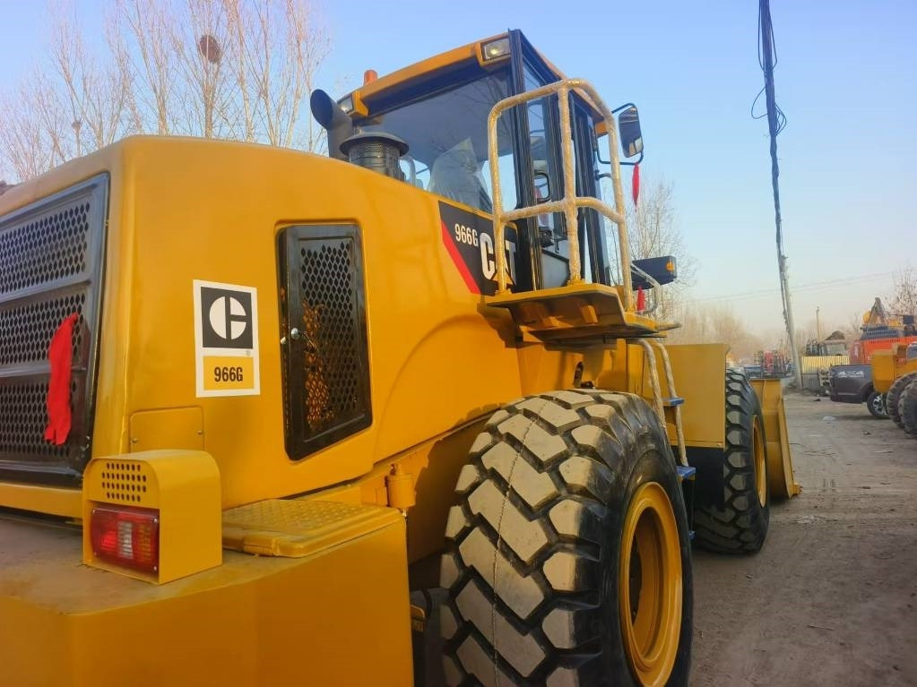 CAT 966 G - Utovarivač na kotačima: slika CAT 966 G - Utovarivač na kotačima CAT 966 G - Utovarivač na kotačima: slika CAT 966 G - Utovarivač na kotačima