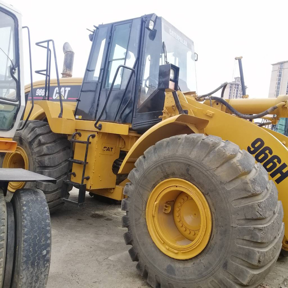 CAT 966 H - Utovarivač na kotačima: slika CAT 966 H - Utovarivač na kotačima CAT 966 H - Utovarivač na kotačima: slika CAT 966 H - Utovarivač na kotačima