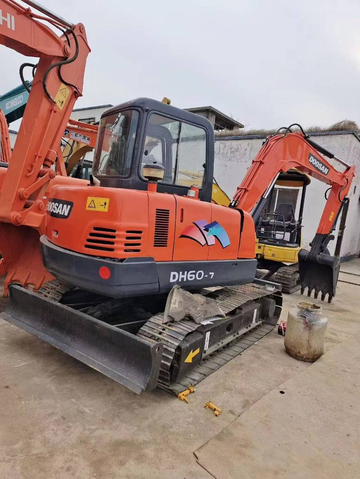 Doosan DH 60-7 - Mini bager: slika Doosan DH 60-7 - Mini bager Doosan DH 60-7 - Mini bager: slika Doosan DH 60-7 - Mini bager
