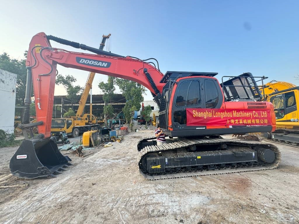 Doosan DX 225 LC - Bager gusjeničar: slika Doosan DX 225 LC - Bager gusjeničar Doosan DX 225 LC - Bager gusjeničar: slika Doosan DX 225 LC - Bager gusjeničar