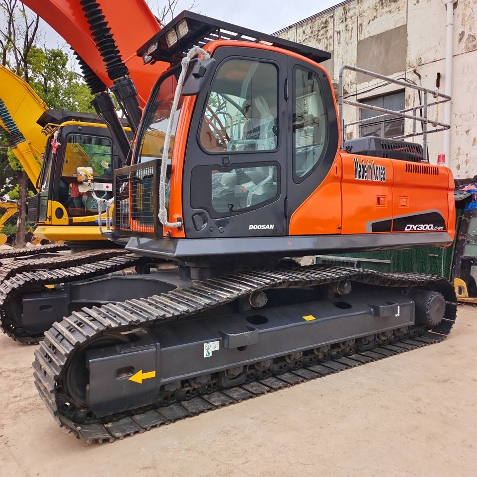 Doosan DX 300 - Bager gusjeničar: slika Doosan DX 300 - Bager gusjeničar Doosan DX 300 - Bager gusjeničar: slika Doosan DX 300 - Bager gusjeničar
