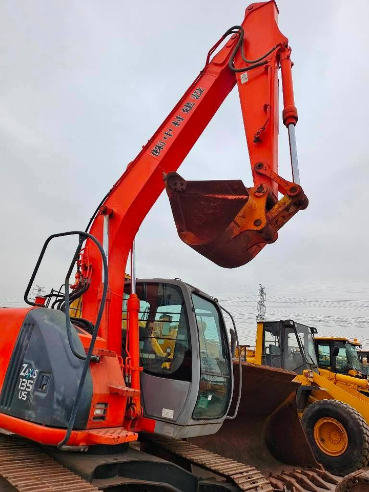 Hitachi ZX 135 US - Bager gusjeničar: slika Hitachi ZX 135 US - Bager gusjeničar Hitachi ZX 135 US - Bager gusjeničar: slika Hitachi ZX 135 US - Bager gusjeničar