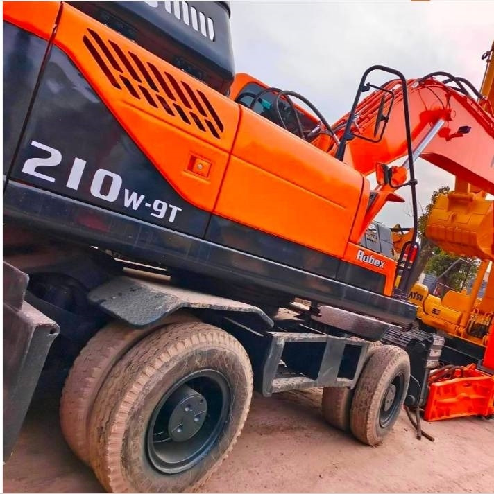 Hyundai 210 W-9 - Bager na kotačima: slika  Hyundai 210 W-9 - Bager na kotačima Hyundai 210 W-9 - Bager na kotačima: slika  Hyundai 210 W-9 - Bager na kotačima