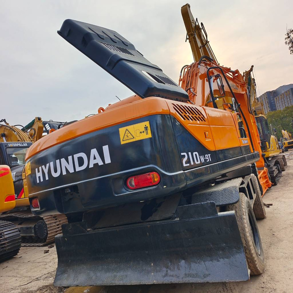 Hyundai 210W-9 - Bager na kotačima: slika Hyundai 210W-9 - Bager na kotačima Hyundai 210W-9 - Bager na kotačima: slika Hyundai 210W-9 - Bager na kotačima