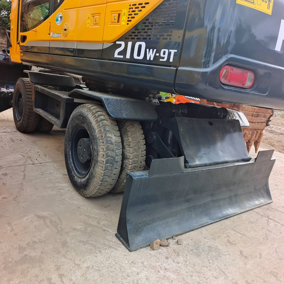 Hyundai 210W-9 - Bager na kotačima: slika Hyundai 210W-9 - Bager na kotačima Hyundai 210W-9 - Bager na kotačima: slika Hyundai 210W-9 - Bager na kotačima