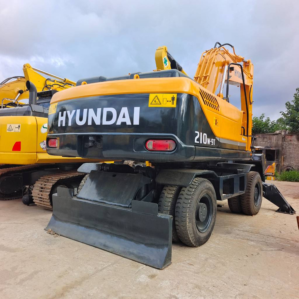Hyundai 210W-9 - Bager na kotačima: slika Hyundai 210W-9 - Bager na kotačima Hyundai 210W-9 - Bager na kotačima: slika Hyundai 210W-9 - Bager na kotačima