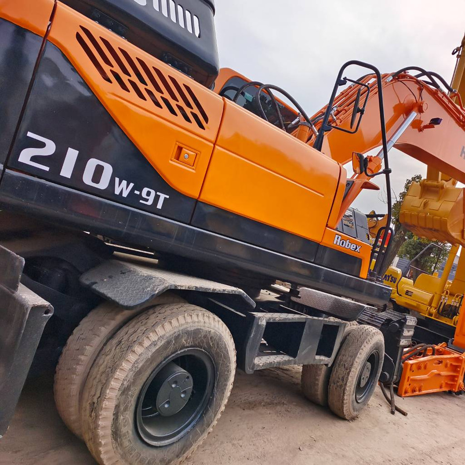 Hyundai 210W-9 - Bager na kotačima: slika Hyundai 210W-9 - Bager na kotačima Hyundai 210W-9 - Bager na kotačima: slika Hyundai 210W-9 - Bager na kotačima
