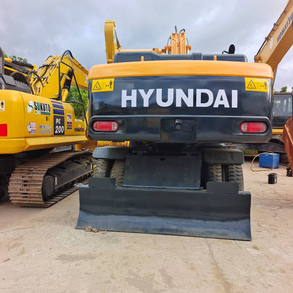 Hyundai 210W-9 - Bager na kotačima: slika Hyundai 210W-9 - Bager na kotačima Hyundai 210W-9 - Bager na kotačima: slika Hyundai 210W-9 - Bager na kotačima