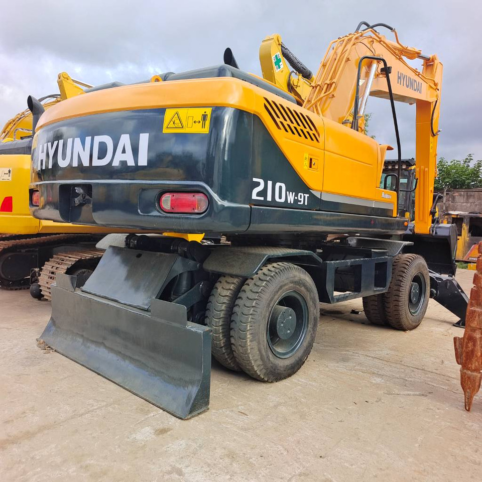 Hyundai 210W-9 - Bager na kotačima: slika Hyundai 210W-9 - Bager na kotačima Hyundai 210W-9 - Bager na kotačima: slika Hyundai 210W-9 - Bager na kotačima