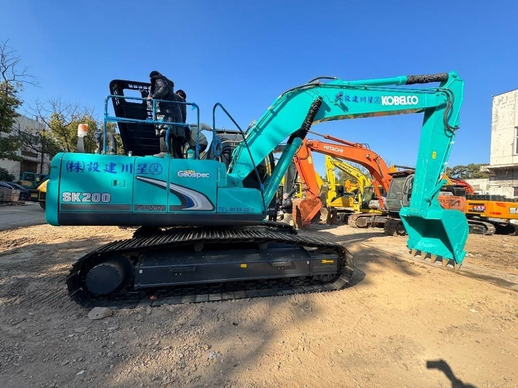 Kobelco SK 200 - Bager gusjeničar: slika Kobelco SK 200 - Bager gusjeničar Kobelco SK 200 - Bager gusjeničar: slika Kobelco SK 200 - Bager gusjeničar