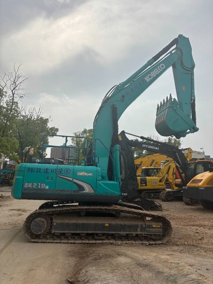 Kobelco SK 210 - Bager gusjeničar: slika Kobelco SK 210 - Bager gusjeničar Kobelco SK 210 - Bager gusjeničar: slika Kobelco SK 210 - Bager gusjeničar