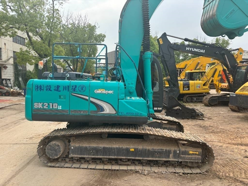 Kobelco SK 210 - Bager gusjeničar: slika Kobelco SK 210 - Bager gusjeničar Kobelco SK 210 - Bager gusjeničar: slika Kobelco SK 210 - Bager gusjeničar