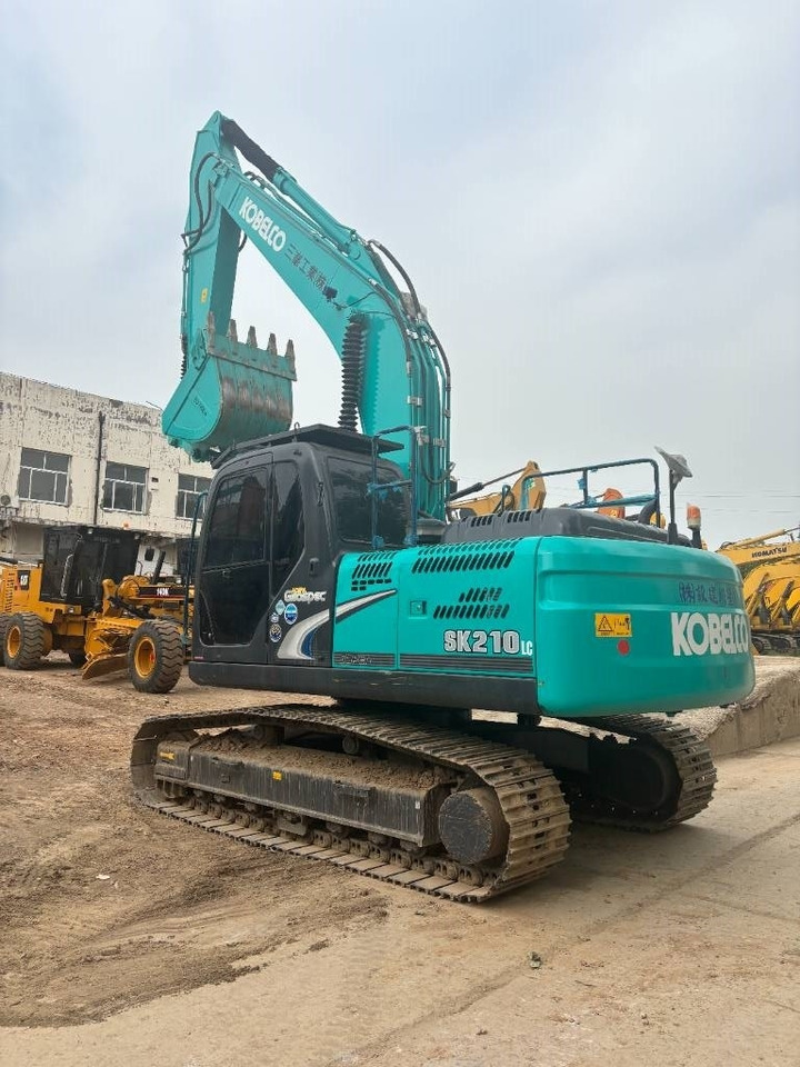 Kobelco SK 210 - Bager gusjeničar: slika Kobelco SK 210 - Bager gusjeničar Kobelco SK 210 - Bager gusjeničar: slika Kobelco SK 210 - Bager gusjeničar