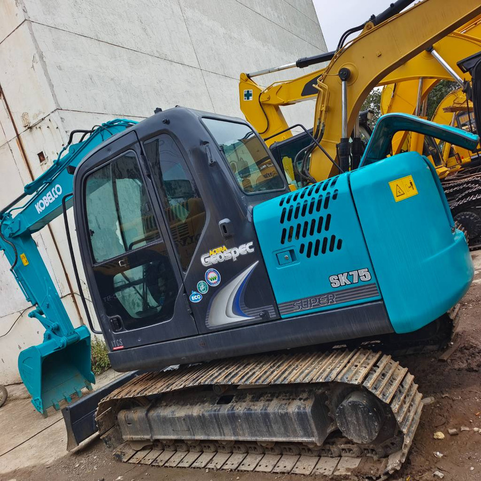 Kobelco SK 75 - Mini bager: slika Kobelco SK 75 - Mini bager Kobelco SK 75 - Mini bager: slika Kobelco SK 75 - Mini bager
