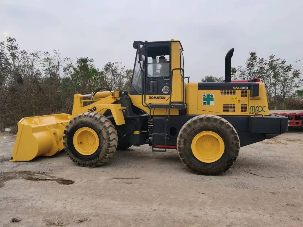 Komatsu WA 320-5 - Utovarivač na kotačima: slika Komatsu WA 320-5 - Utovarivač na kotačima Komatsu WA 320-5 - Utovarivač na kotačima: slika Komatsu WA 320-5 - Utovarivač na kotačima