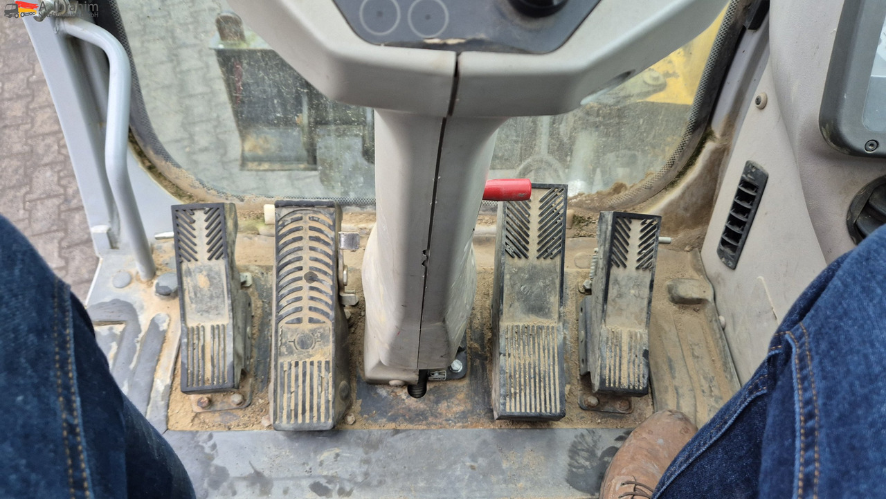 New Holland MH 2.6 Zustand gut, deutsche Maschine incl. Greifer und Dreservo - Bager na kotačima: slika New Holland MH 2.6 Zustand gut, deutsche Maschine incl. Greifer und Dreservo - Bager na kotačima New Holland MH 2.6 Zustand gut, deutsche Maschine incl. Greifer und Dreservo - Bager na kotačima: slika New Holland MH 2.6 Zustand gut, deutsche Maschine incl. Greifer und Dreservo - Bager na kotačima