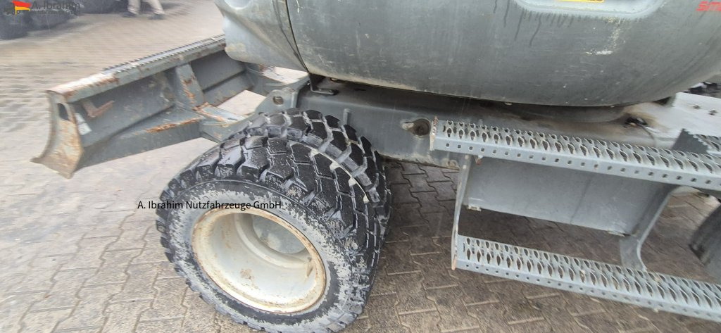 Wacker Neuson 6503 E05-07 hydr. Schnellwechsler mit Oilquick - Bager na kotačima: slika Wacker Neuson 6503 E05-07 hydr. Schnellwechsler mit Oilquick - Bager na kotačima Wacker Neuson 6503 E05-07 hydr. Schnellwechsler mit Oilquick - Bager na kotačima: slika Wacker Neuson 6503 E05-07 hydr. Schnellwechsler mit Oilquick - Bager na kotačima