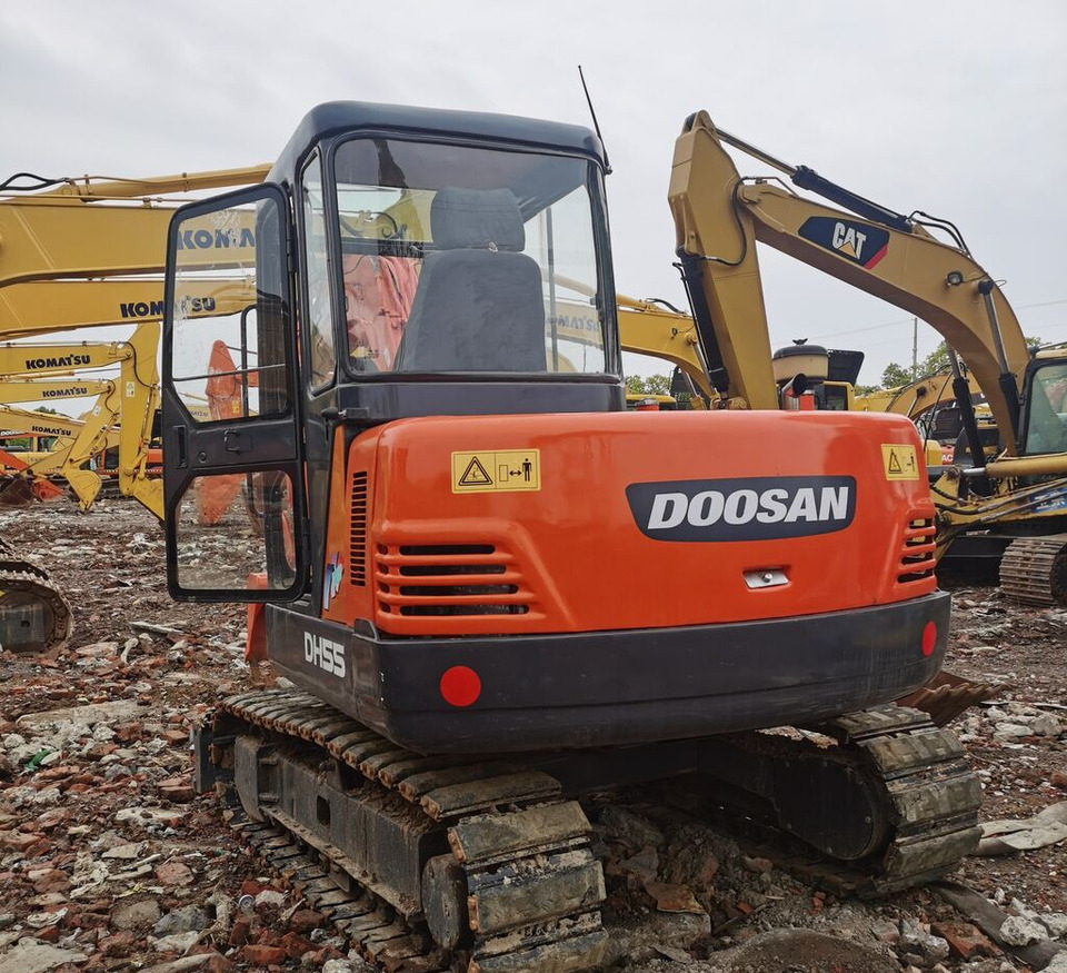 Doosan DH55 - Bager gusjeničar: slika Doosan DH55 - Bager gusjeničar Doosan DH55 - Bager gusjeničar: slika Doosan DH55 - Bager gusjeničar