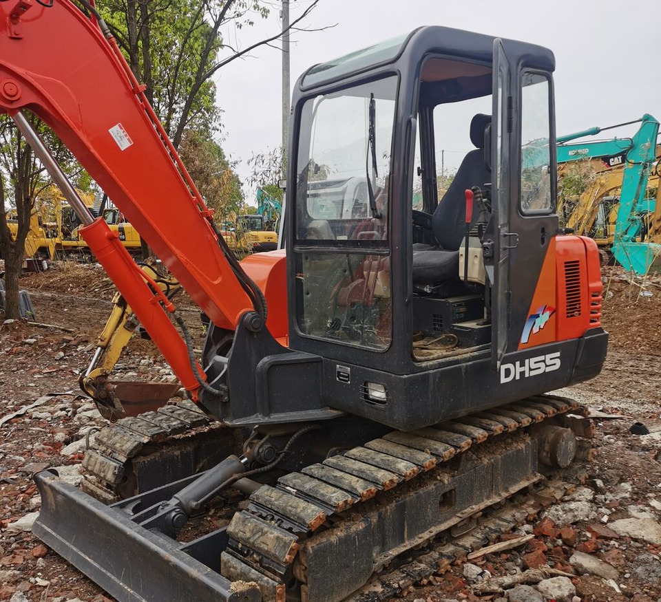 Doosan DH55 - Bager gusjeničar: slika Doosan DH55 - Bager gusjeničar Doosan DH55 - Bager gusjeničar: slika Doosan DH55 - Bager gusjeničar