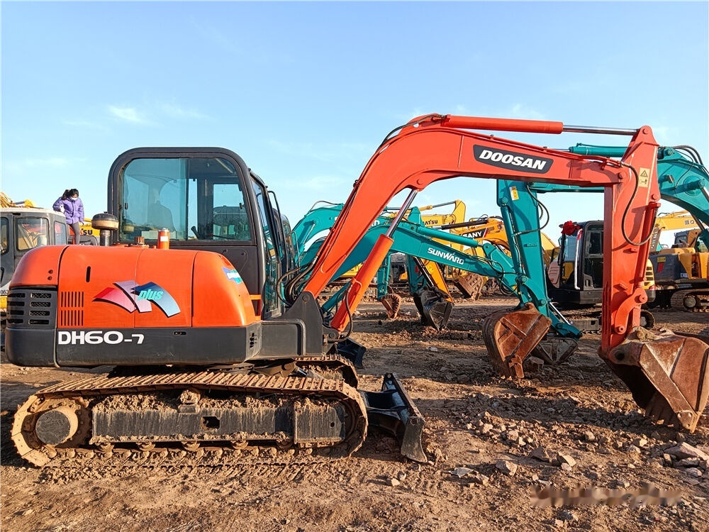 Doosan DH60-7 - Mini bager: slika Doosan DH60-7 - Mini bager Doosan DH60-7 - Mini bager: slika Doosan DH60-7 - Mini bager