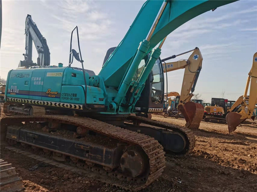 Kobelco SK210LC - Bager gusjeničar: slika Kobelco SK210LC - Bager gusjeničar Kobelco SK210LC - Bager gusjeničar: slika Kobelco SK210LC - Bager gusjeničar
