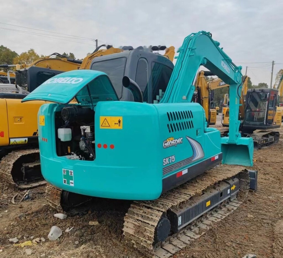 Kobelco SK75 - Mini bager: slika Kobelco SK75 - Mini bager Kobelco SK75 - Mini bager: slika Kobelco SK75 - Mini bager