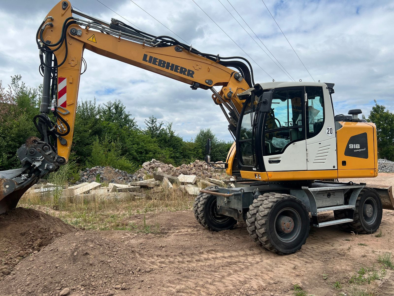 Liebherr A 918 Compact Likufix SW 48 - Bager na kotačima: slika Liebherr A 918 Compact Likufix SW 48 - Bager na kotačima Liebherr A 918 Compact Likufix SW 48 - Bager na kotačima: slika Liebherr A 918 Compact Likufix SW 48 - Bager na kotačima