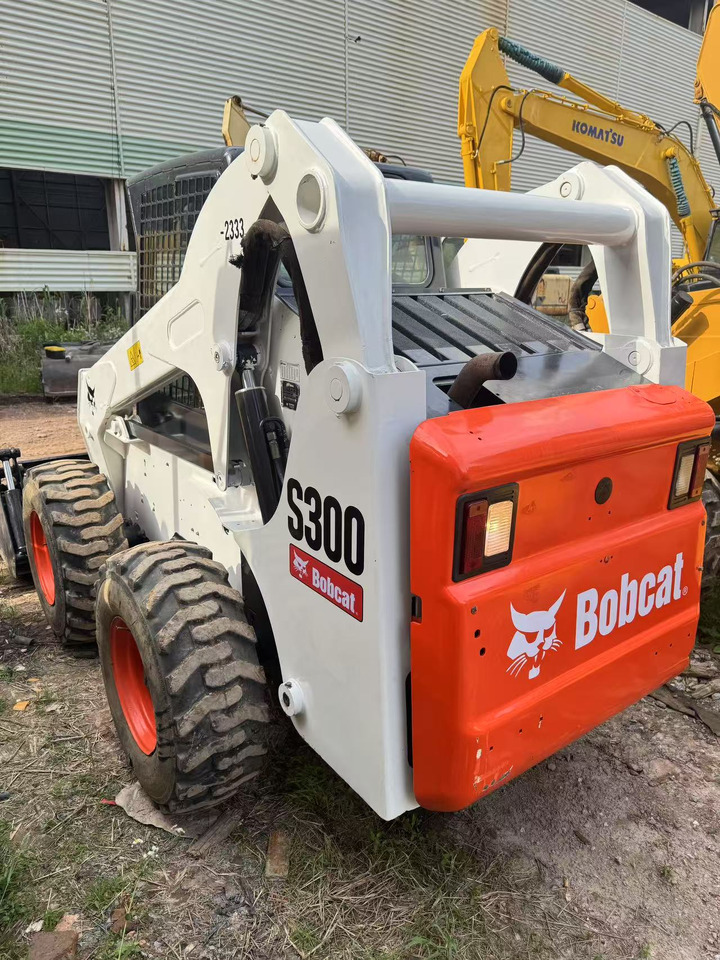 BOBCAT S300 - Mini utovarivač: slika BOBCAT S300 - Mini utovarivač BOBCAT S300 - Mini utovarivač: slika BOBCAT S300 - Mini utovarivač