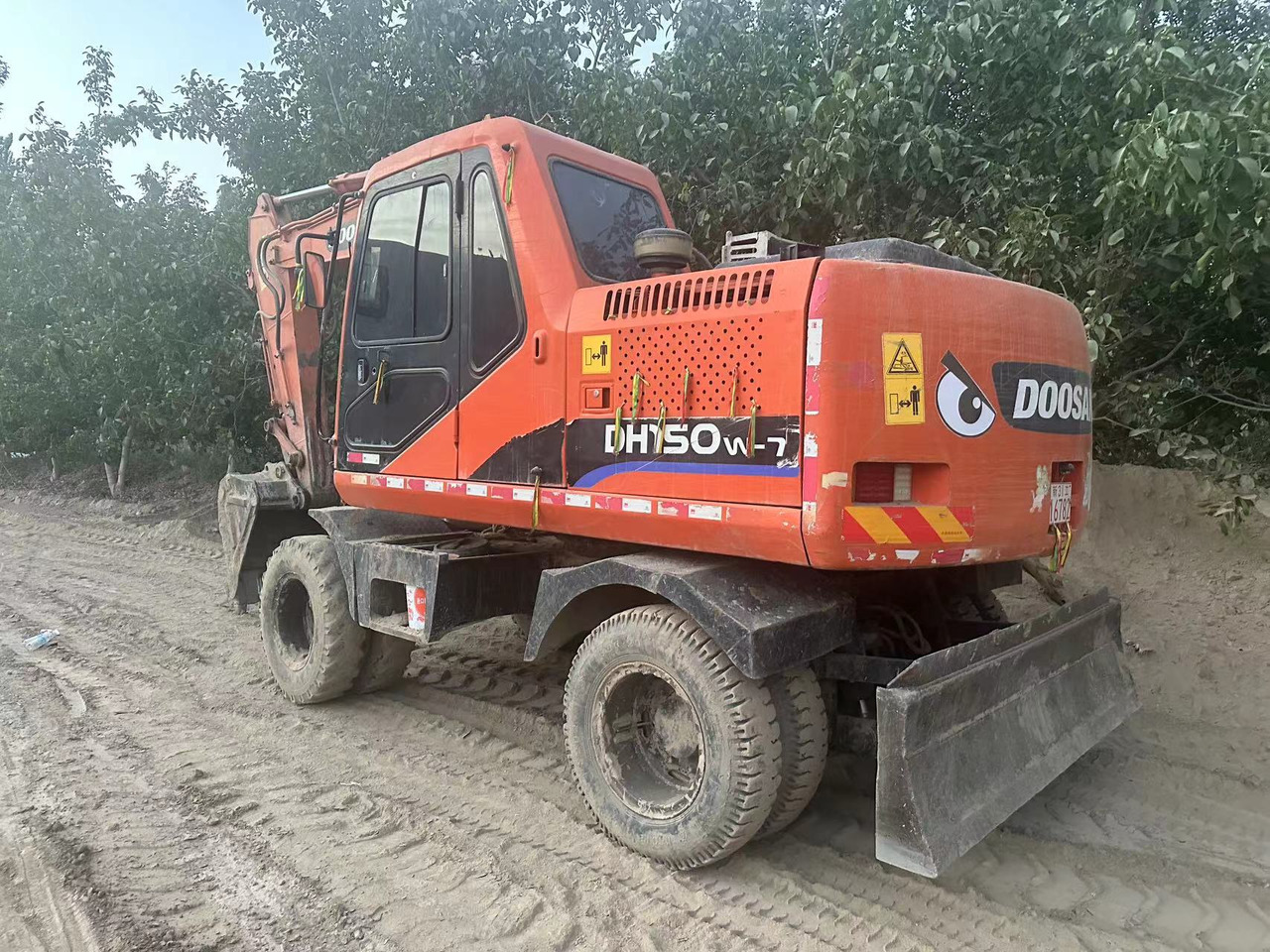 DOOSAN DH150W-7 - Bager na kotačima: slika DOOSAN DH150W-7 - Bager na kotačima DOOSAN DH150W-7 - Bager na kotačima: slika DOOSAN DH150W-7 - Bager na kotačima
