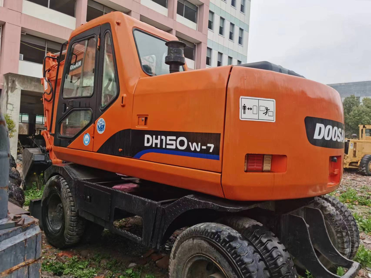 DOOSAN DH150W-7 - Bager na kotačima: slika DOOSAN DH150W-7 - Bager na kotačima DOOSAN DH150W-7 - Bager na kotačima: slika DOOSAN DH150W-7 - Bager na kotačima