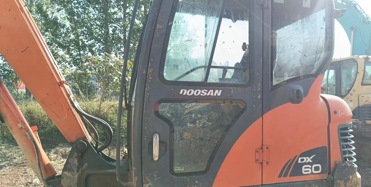 DOOSAN dx60 - Mini bager: slika DOOSAN dx60 - Mini bager DOOSAN dx60 - Mini bager: slika DOOSAN dx60 - Mini bager