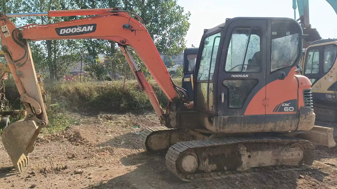 DOOSAN dx60 - Mini bager: slika DOOSAN dx60 - Mini bager DOOSAN dx60 - Mini bager: slika DOOSAN dx60 - Mini bager