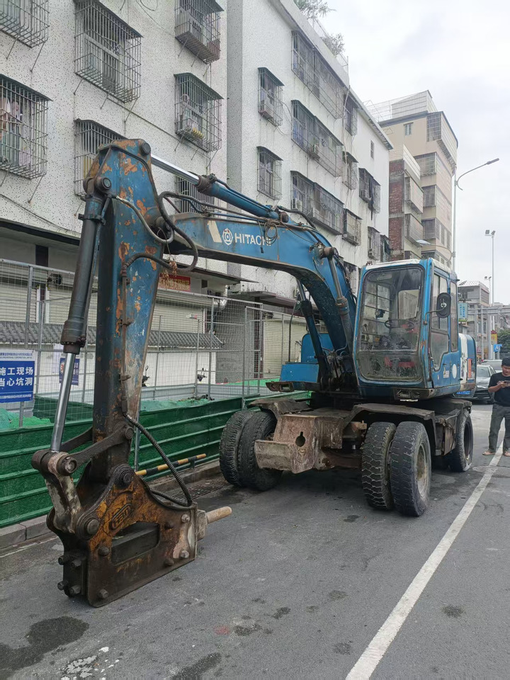 HITACHI EX100WD-2 - Bager na kotačima: slika HITACHI EX100WD-2 - Bager na kotačima HITACHI EX100WD-2 - Bager na kotačima: slika HITACHI EX100WD-2 - Bager na kotačima