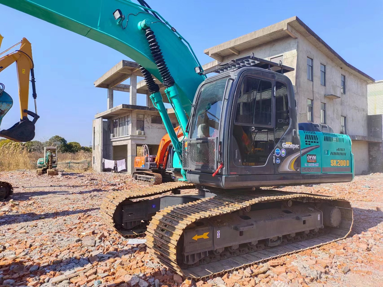 KOBELCO SK200D - Bager gusjeničar: slika KOBELCO SK200D - Bager gusjeničar KOBELCO SK200D - Bager gusjeničar: slika KOBELCO SK200D - Bager gusjeničar